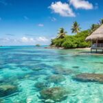 Tropical beach hut with turquoise water.